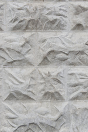 Abstract volumetric texture of gray color. The wall of the house. Close. Vertical snapshotの写真素材