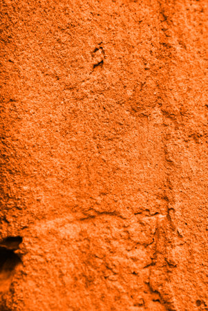 The texture is abstract orange color and a special pattern. Vertical photoの写真素材