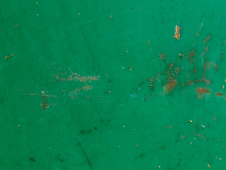 Abstract texture of a metal wall with rusty scuffs. Green color. Closeupの写真素材