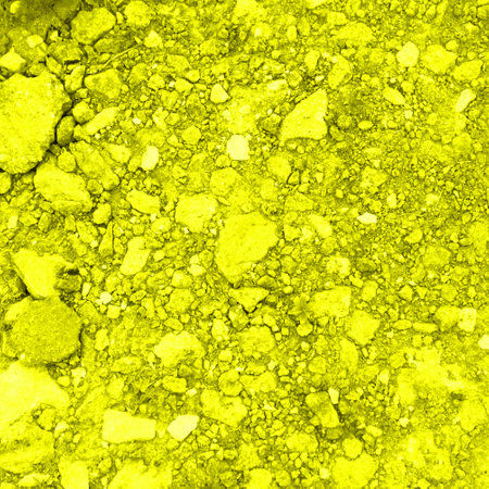 Abstract yellow texture made of stones of different sizes. Close.の写真素材