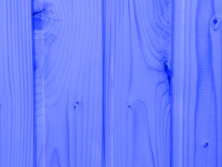 A texture of blue lines running from top to bottom. Place for the text.の写真素材