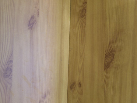 The texture of the finishing coating for houses. The color is wood. Forms an angle. Close.の写真素材