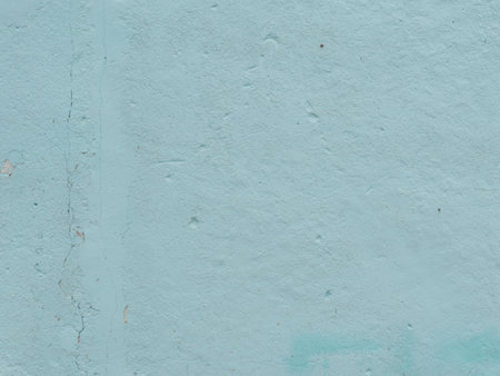 The texture of the wall is blue with damage. Close.の写真素材