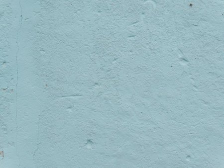 The texture of the wall is blue with damage. Close.の写真素材