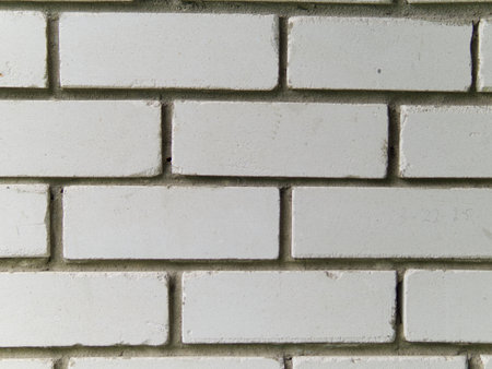 The texture of the brick wall is white. Close.の写真素材