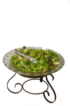 Dish with a salad of leaves on a white background. Isolation.の写真素材