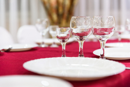Glasses on a Banquet table serving holiday.の写真素材