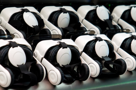 many virtual reality VR helmet on dark backgroundの写真素材