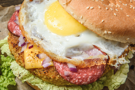 Hamburger with vegetables and eggの写真素材