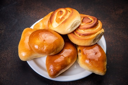 assorted fresh lush buns and piesの写真素材