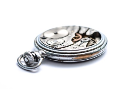 Retro pocket watch on a white backgroundの写真素材