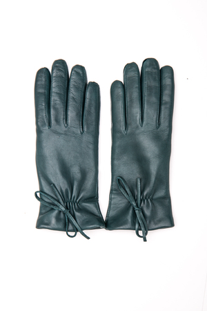 turquoise gloves on a white backgroundの写真素材