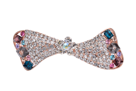 brooch with a bow of Gems isolated on whiteの写真素材