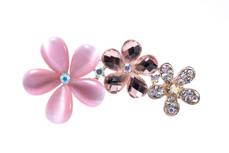 brooch with flowers isolated on whiteの写真素材