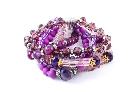 bracelet of colored beads isolated on whiteの写真素材