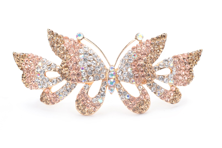 brooch with butterfly isolated on whiteの写真素材