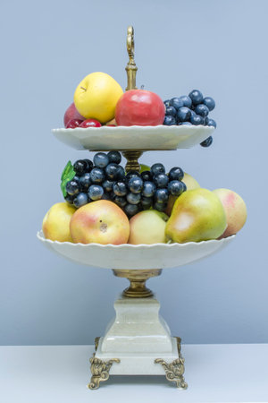 two tier stand with  fruits