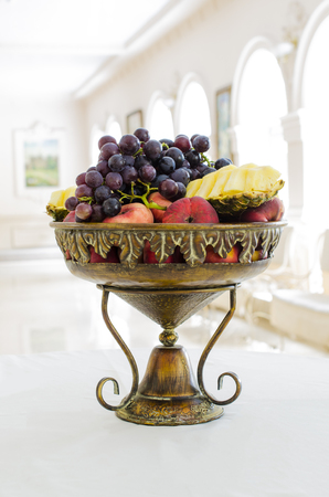 bowl with fruit in the interiorの写真素材
