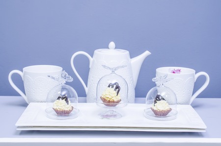 Tea set and cakesの写真素材