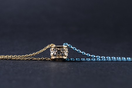 gold bracelet isolated on blackの写真素材