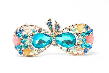 brooch with a bow of Gems isolated on whiteの写真素材