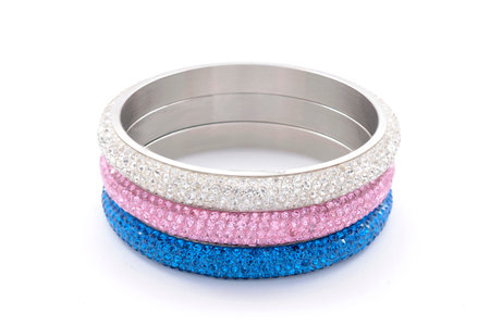 three bracelets on a white background