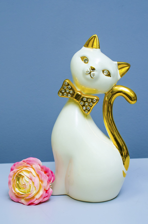 statue of cat and flowerの写真素材