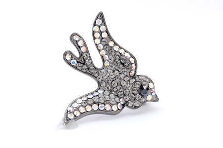 brooch bird on a white backgroundの写真素材
