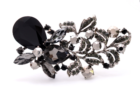 brooch in the form of a fish on a white backgroundの写真素材