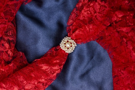 brooch for scarf with a pearl with a silk scarfの写真素材