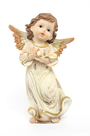 Christmas angel figurine isolated on whiteの写真素材