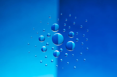 multicolored drops of water on color  background