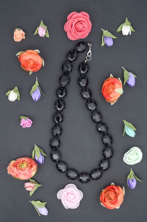 flowers and beads on blackの写真素材