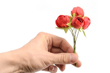 hand with a bouquet isolatedの写真素材