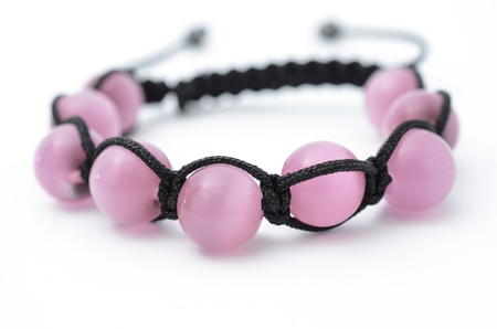 bracelet of pink beads isolatedの写真素材