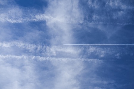 blue sky with airplane, minimalismの写真素材
