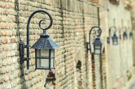 lanterns on the background of an old brick wallの写真素材
