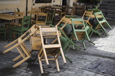 before the opening of cafes, folded chairsの写真素材