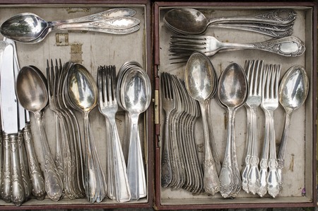 old spoons in a boxの写真素材