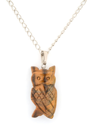 Pendant with owl isolated on whiteの写真素材