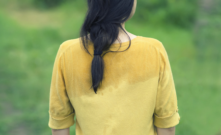 young girl, back view, rain. The wet clothing. ?onceptの写真素材
