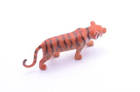 toy tiger isolated on whiteの写真素材
