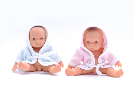 baby dolls isolated on whiteの写真素材
