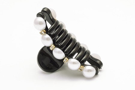 barrette clasp-pin with pearl isolated on whiteの写真素材