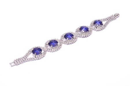 silver bracelet with precious stones isolated on whiteの写真素材