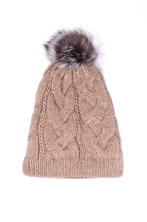 knitted hat with bubo isolated on white
