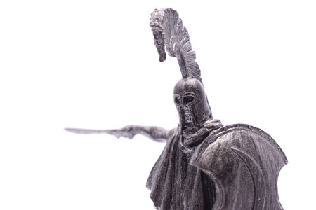 tin soldier Spartan warrior with sword and shield isolated on whiteの写真素材
