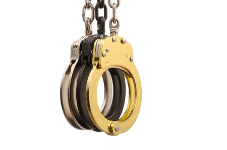 Handcuffs on a white backgroundの写真素材