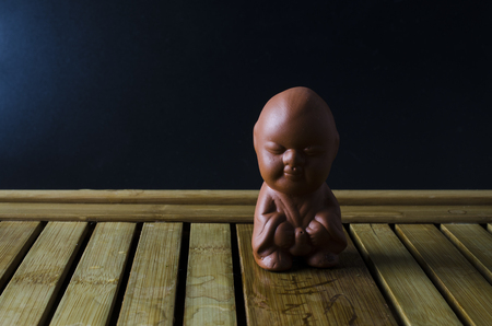clay boy figurine for Chinese tea ceremonyの写真素材