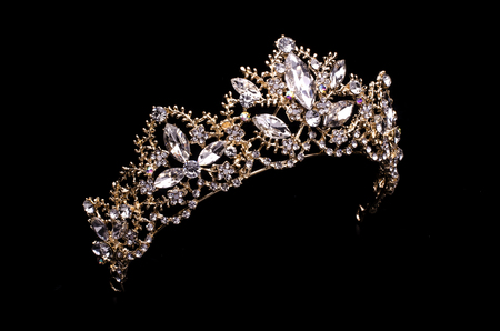 golden diadem with diamonds isolated on blackの写真素材